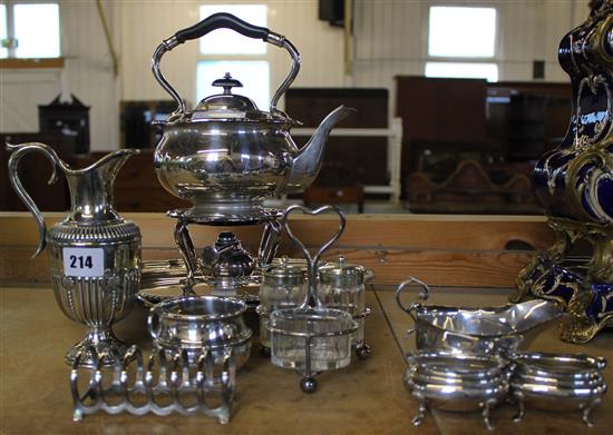 Plated wares- tea kettle burner and stand, 2 salvers, cruet etc and silver sauceboat and pair salts
